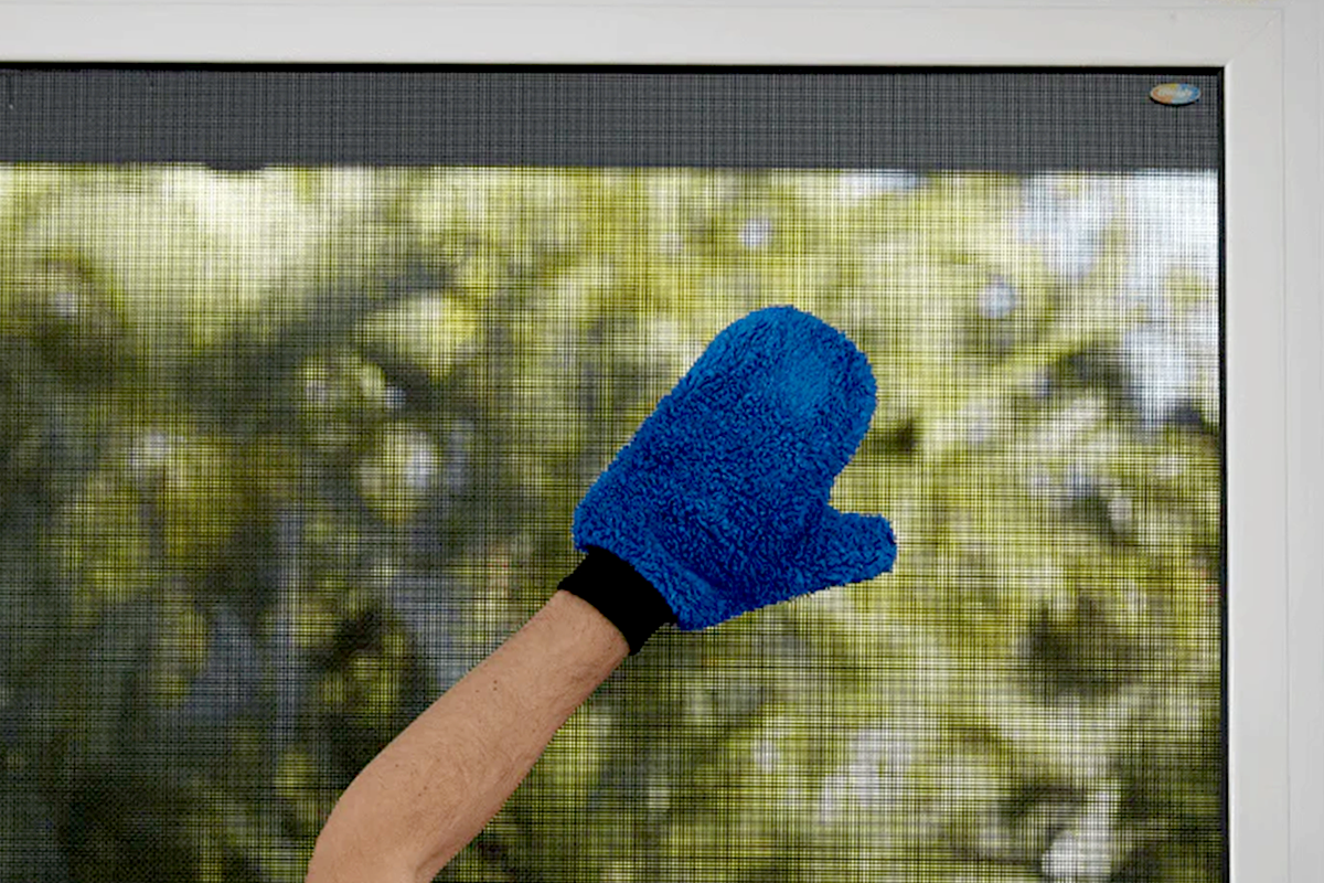 A microfibre Crimsafe Security Screen cleaning glove